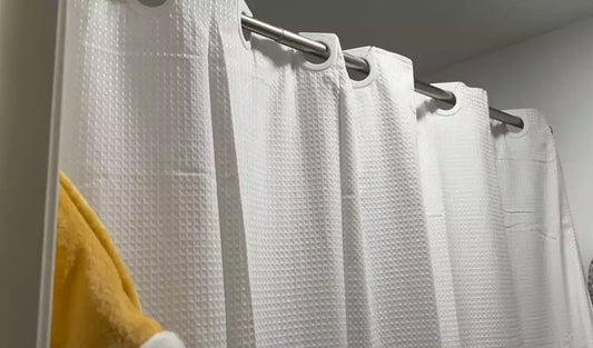 Inhousolu NO hooks needed shower curtain with changeable liner! This will save you some money.